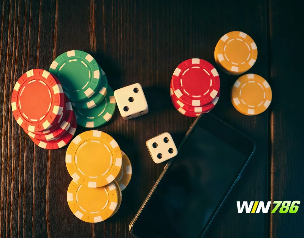 Casino chips, dice and smartphone representing an online betting platform review
